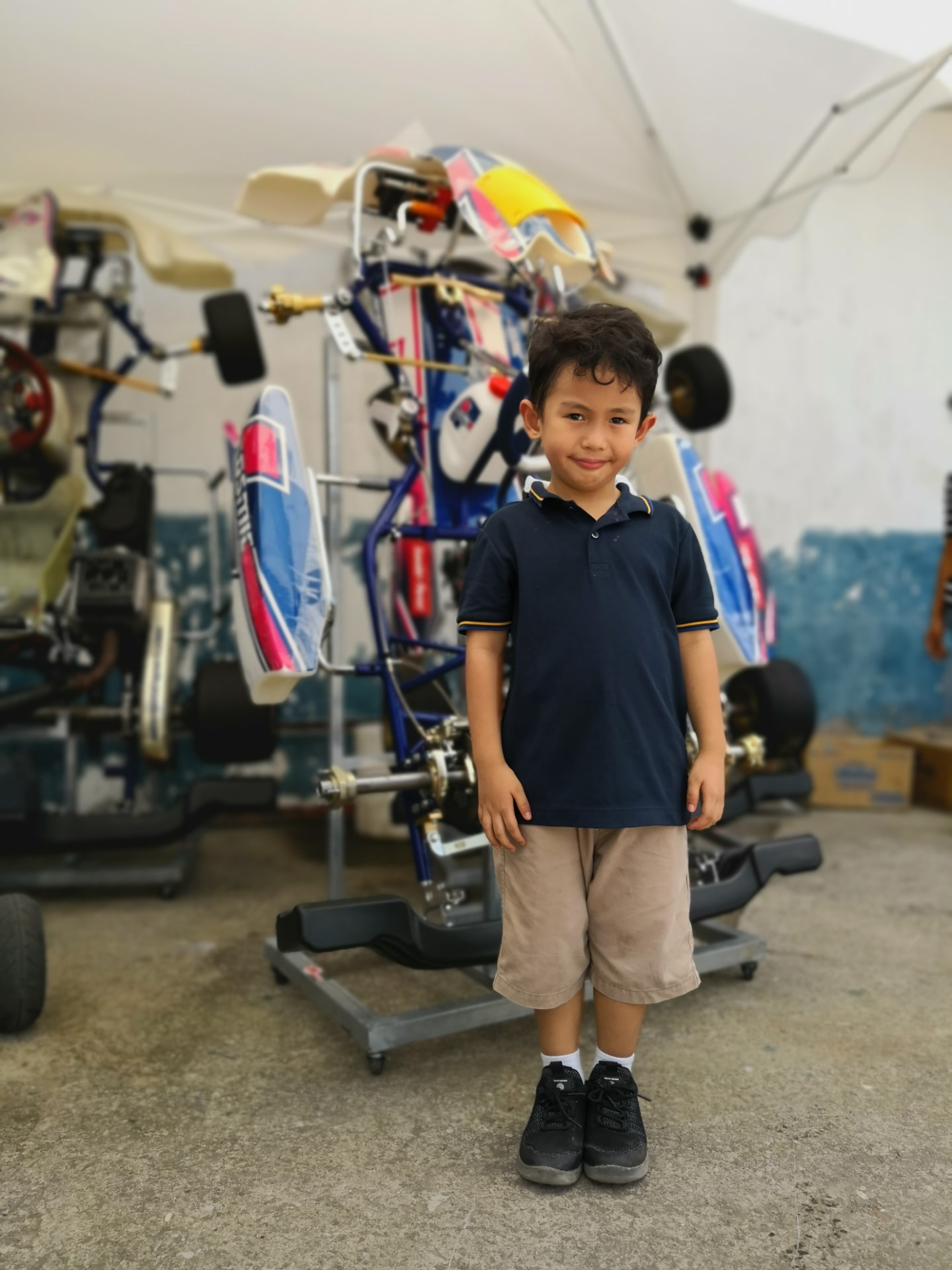 Antonio Racelis visiting a kart workshop