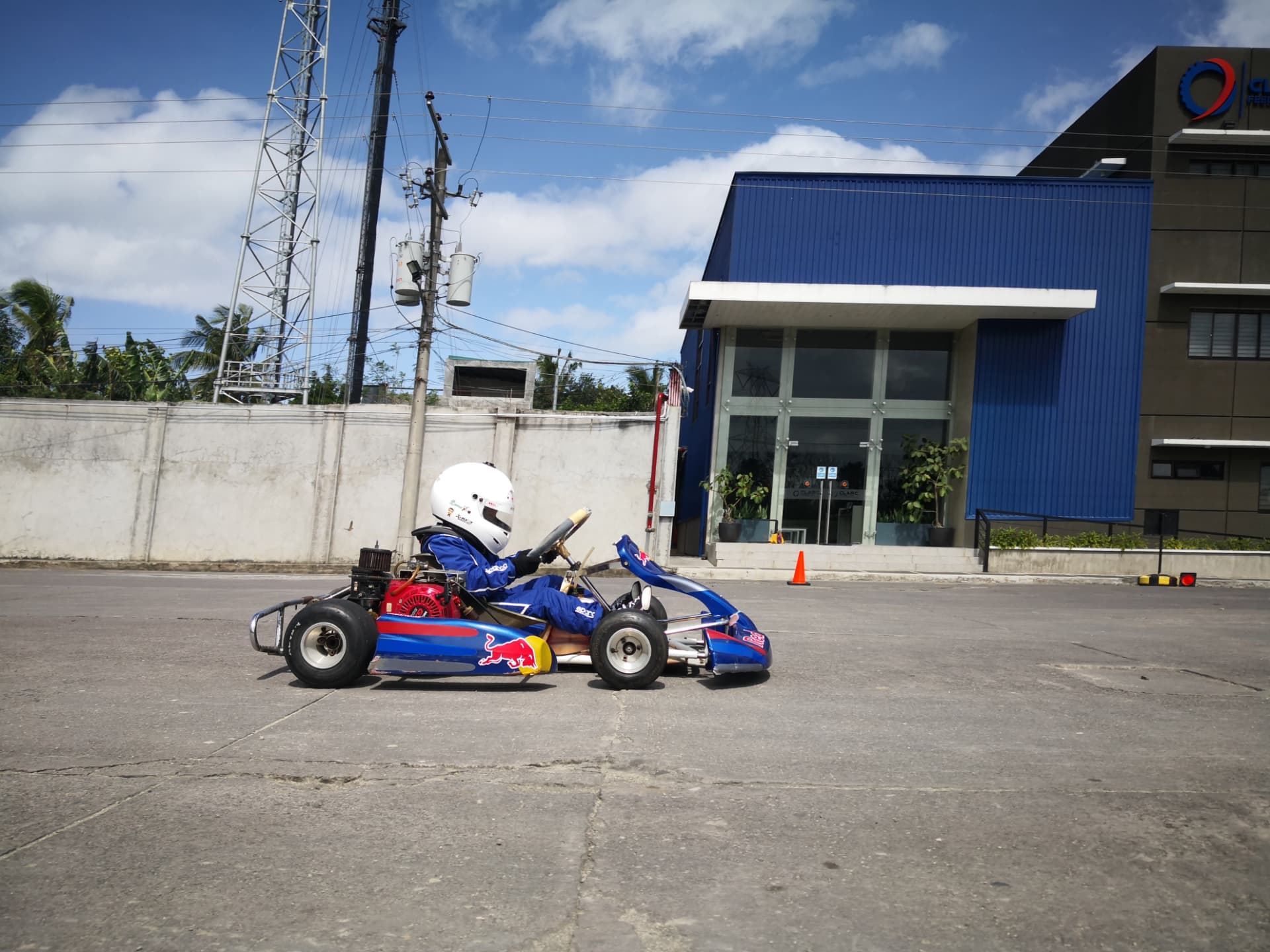 Antonio Racelis practising in a kart outside the family office