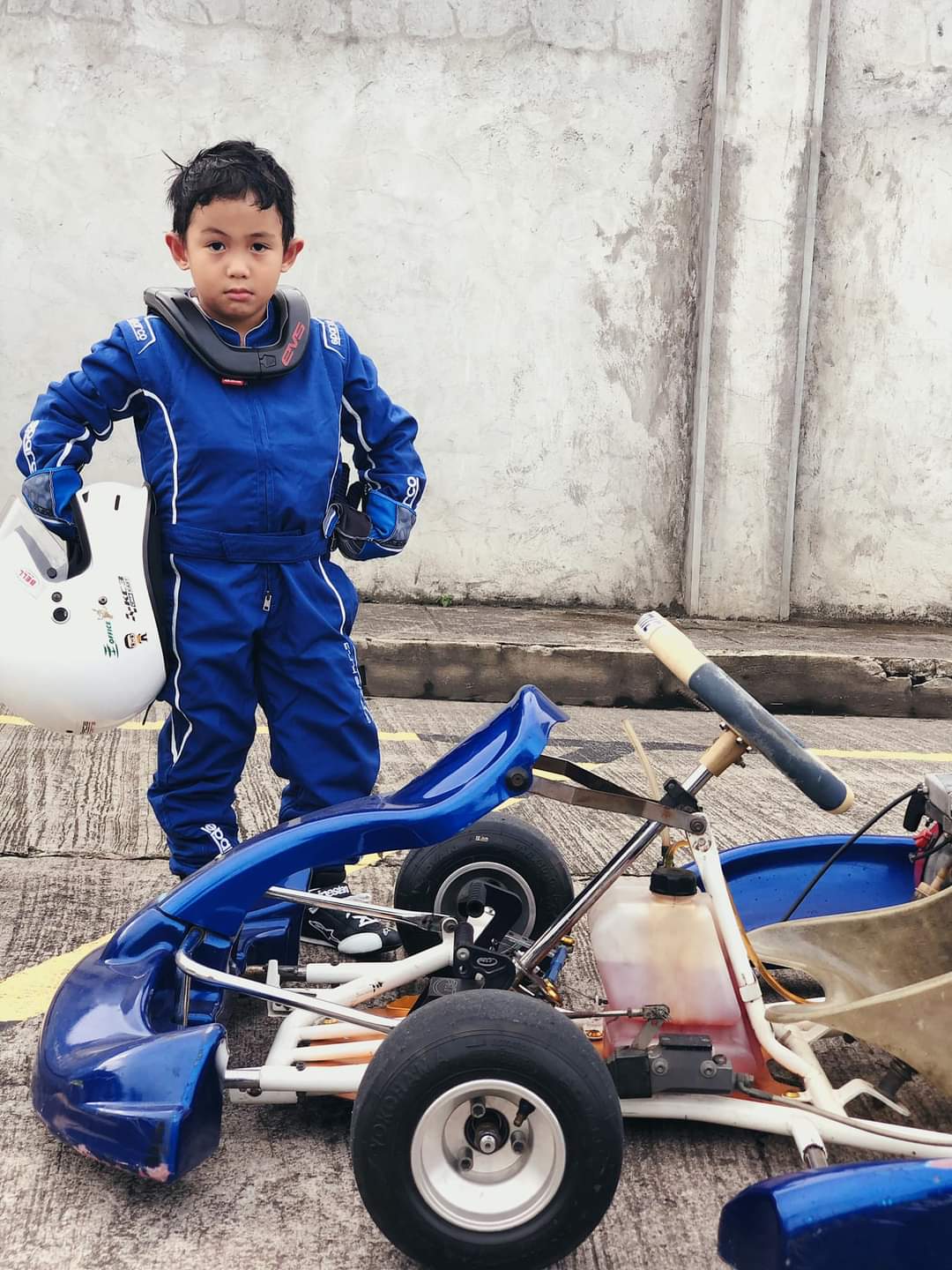 Antonio Racelis beside his first practice kart