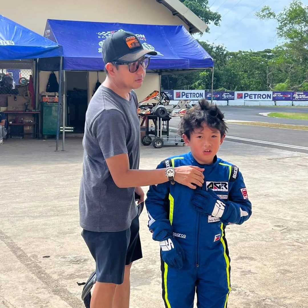 Antonio Racelis with his father before the Palawan clubrace