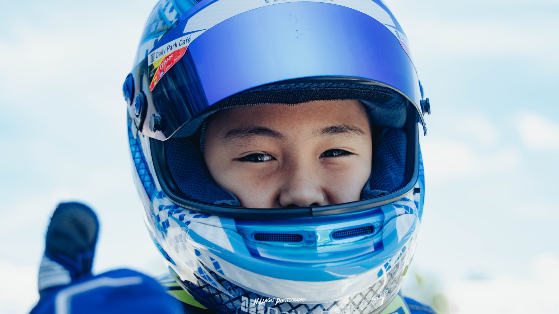 Antonio Racelis looking through his helmet visor