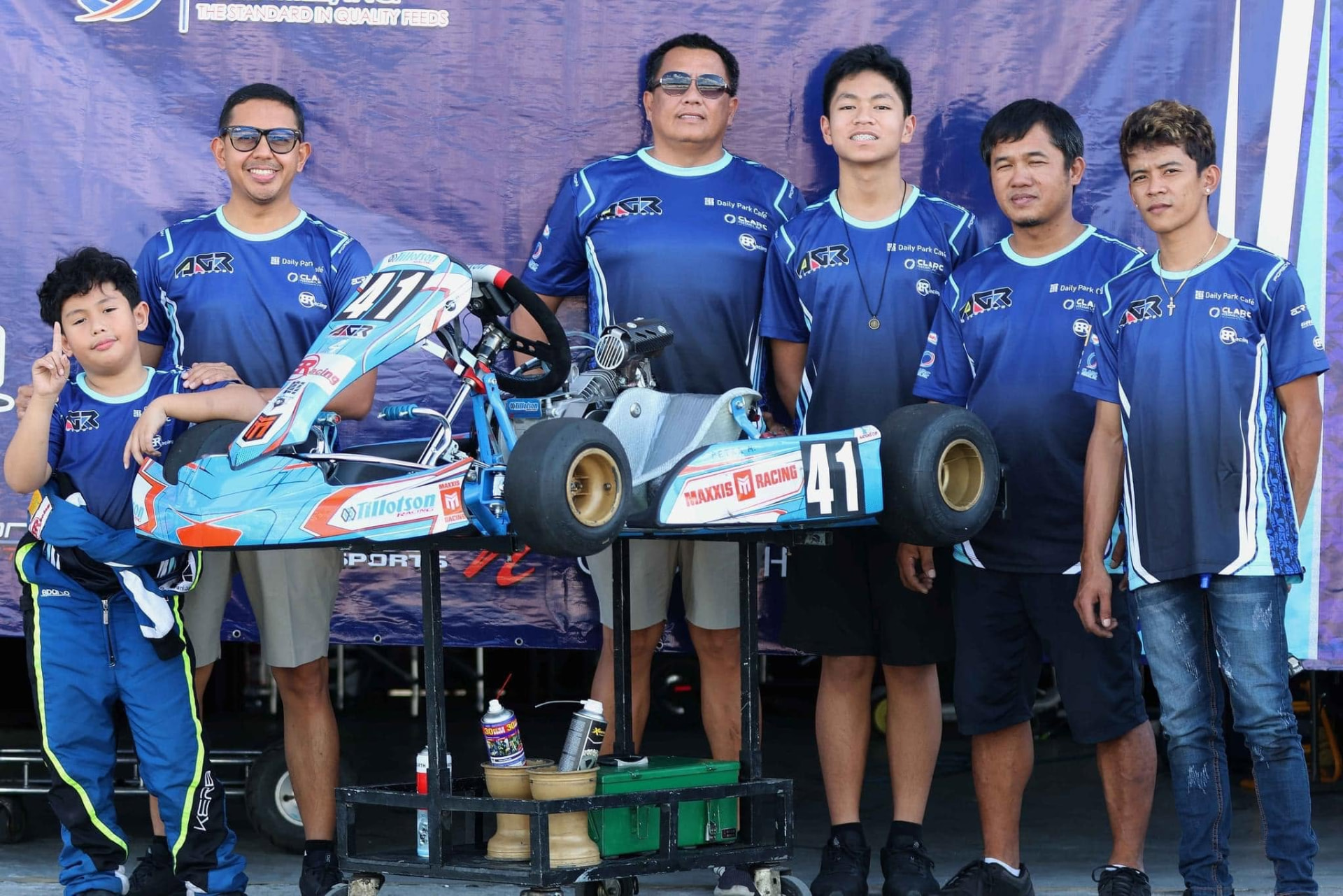 Antonio Racelis with his team and kart number 41