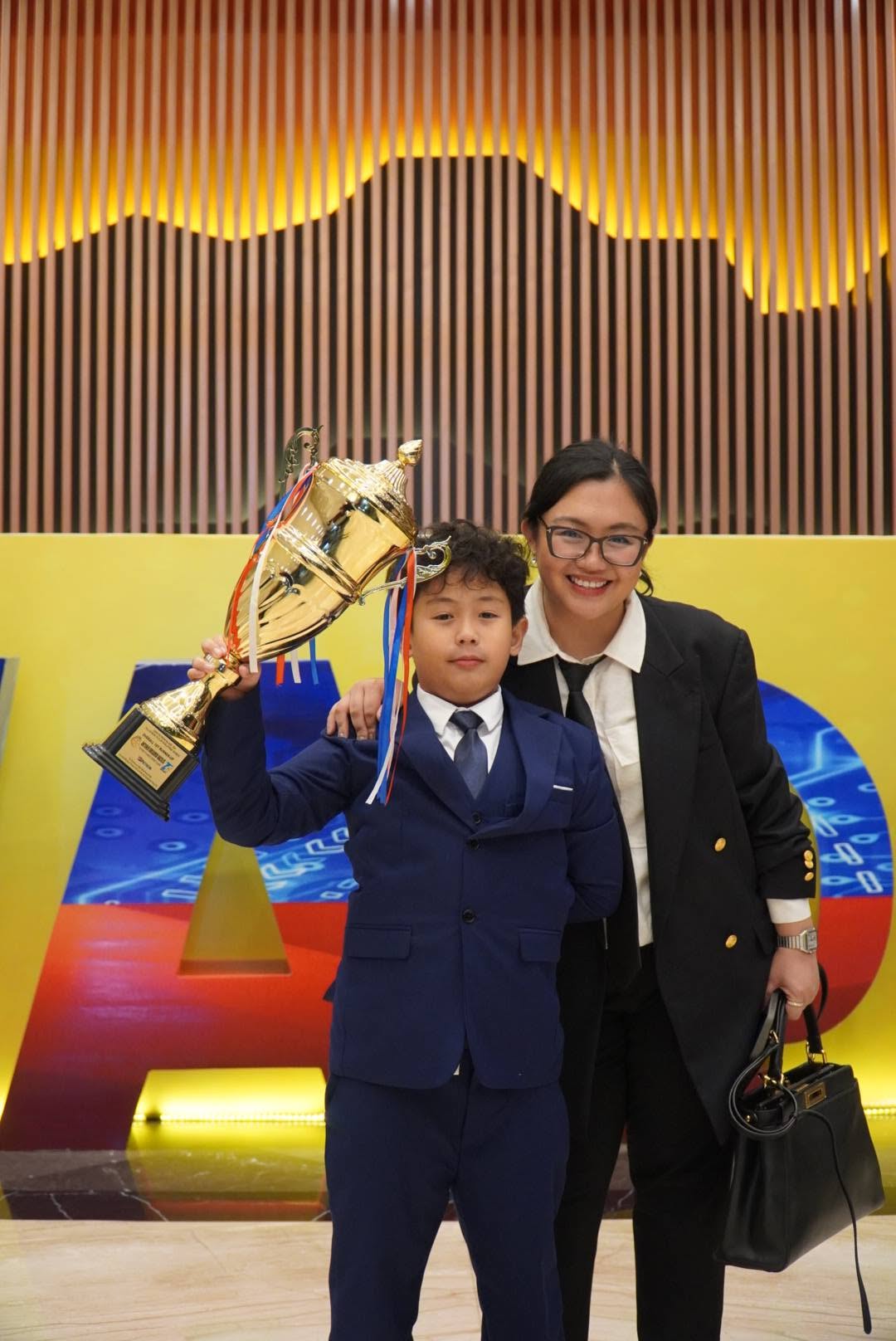 Antonio Racelis celebrating with his family at the awards