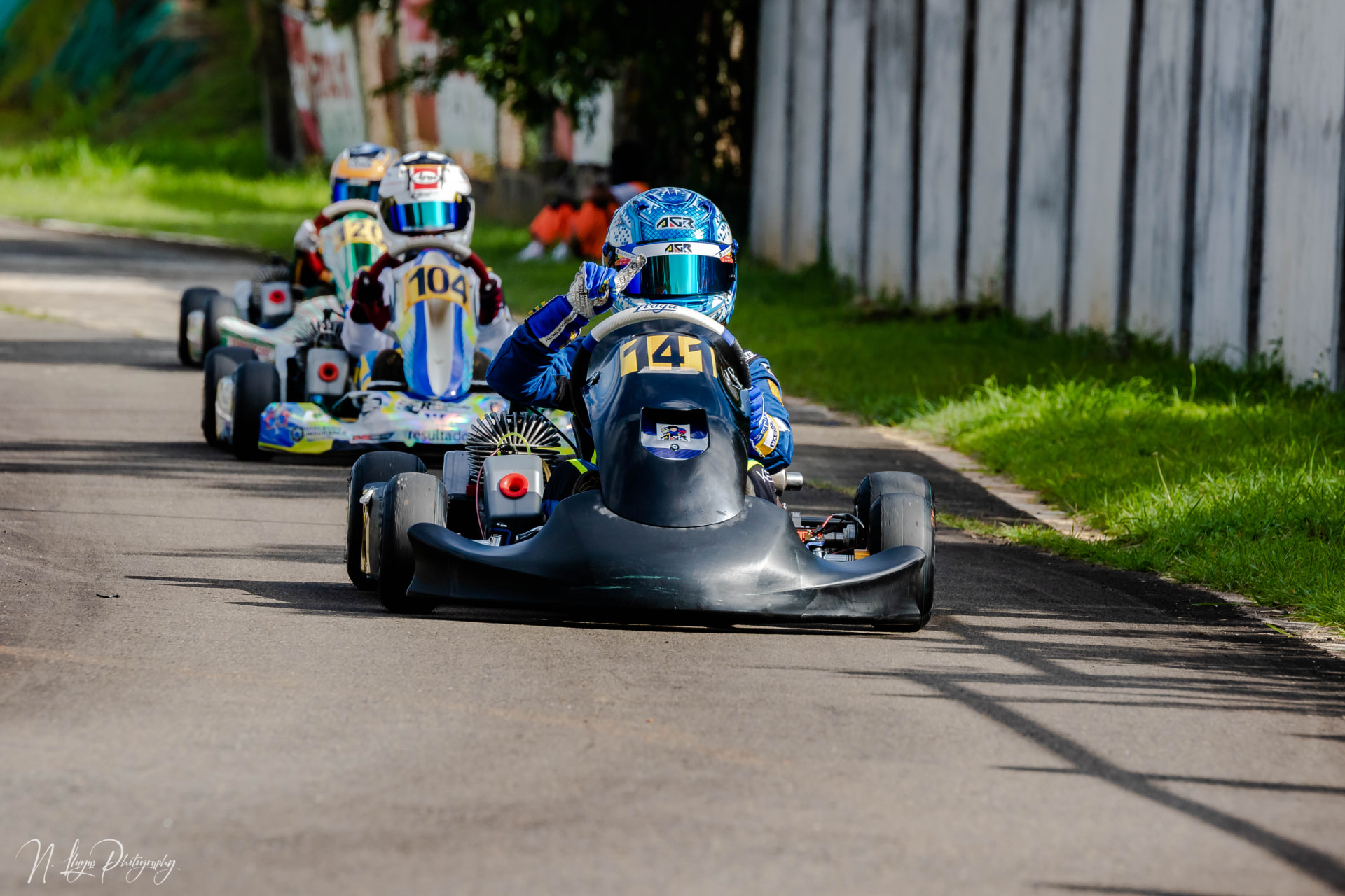 Antonio Racelis waves from kart number 14