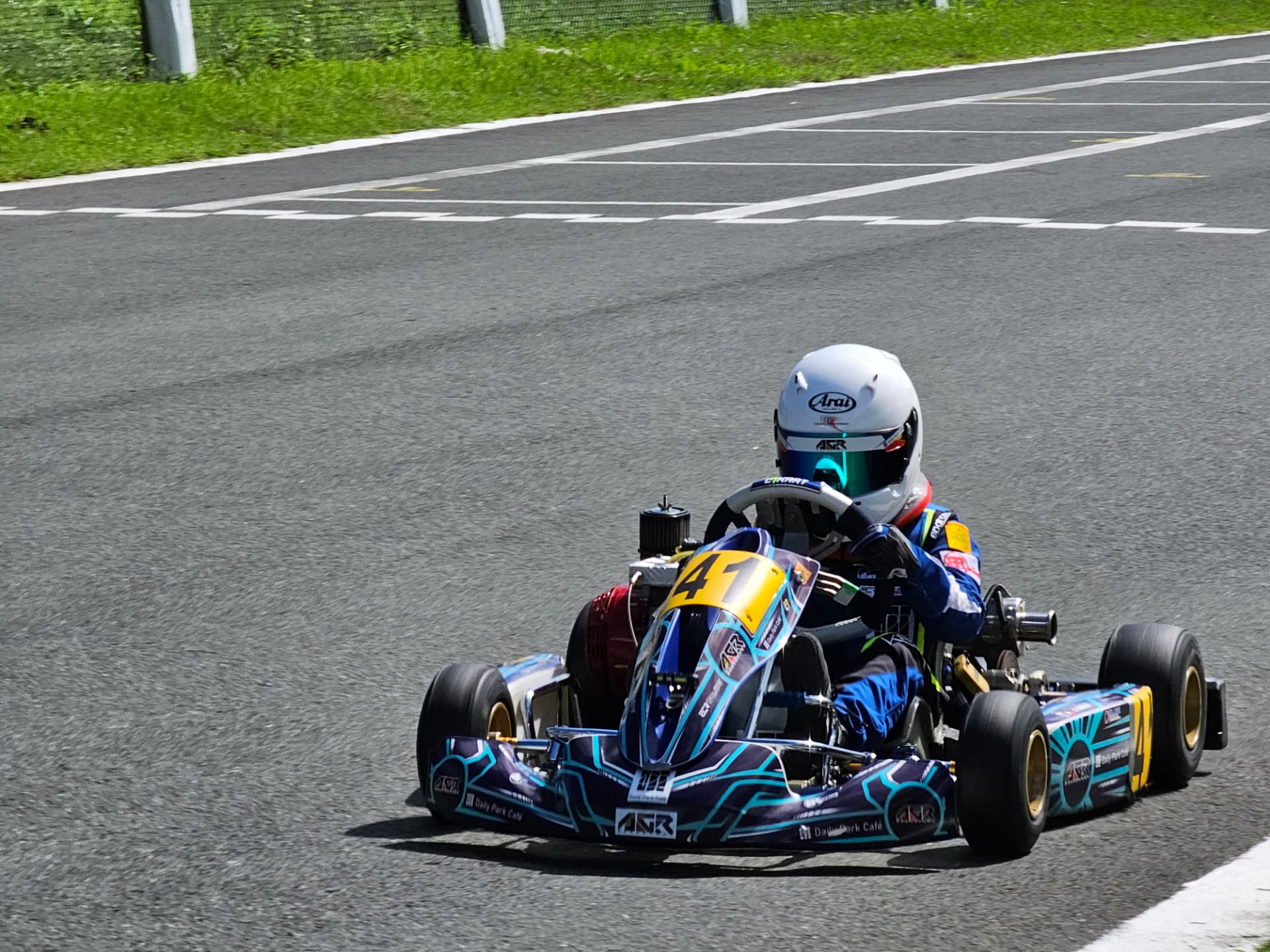 Antonio Racelis driving kart number 41 on track