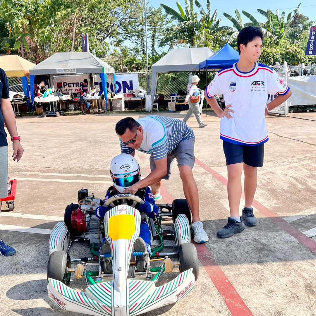The team preparing kart number 41 in the Palawan paddock